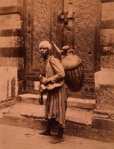 Egyptský nosič vody (sépiová fotografie)