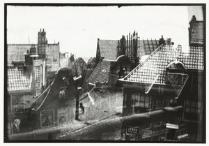 Pohled přes střechy v Amsterdamu od George Hendrik Breitner