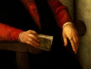 Předpokládaný portrét Francoise Rabelaise (1494-1553), francouzského spisovatele a lékaře. Detail knihy, kterou drží v ruce, a rytíře, kterého nosí na prstě. Obraz Giovanni Battista Moroni (1525-1578) od Giovanni Battista Moroni