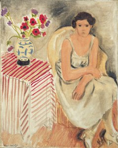Žena na židli - Květiny na stole nebo karafiáty od Henri Matisse
