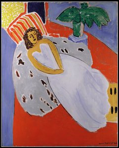 Mladá žena v bílém, červené pozadí od Henri Matisse
