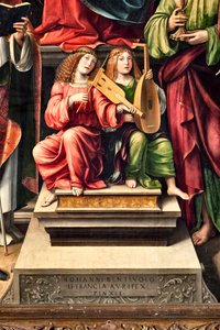Hudebníci Andělé, detail Panny Marie s dítětem a sv. Prokula, evangelista sv. Jana, sv. Augustina, sv. Šebestiána (obraz