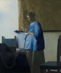 Žena v modrém čtení dopisu Žena čte dopis