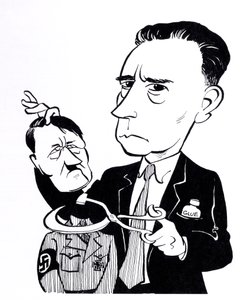 John Heartfield, karikatura s Adolfem Hitlerem od John Minnion