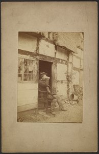 [Sedící muž pije z hrnku v otevřených dveřích] od John Whistler
