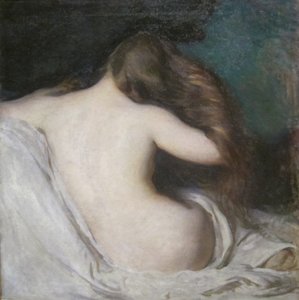 Žena sušící vlasy