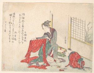 Žena skládající látku od Katsushika Hokusai