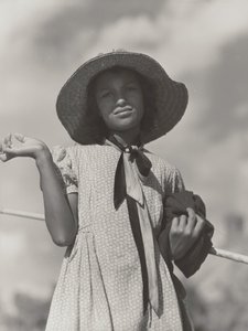 Dcera cajunské rodiny se vrací domů po rybaření v řece Cane, Melrose, Louisiana