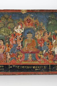 Detail z obálky buddhistického rukopisu (neprůhledné wc na dřevě)