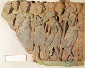Vítězství nad hadem, reliéf zobrazující Buddhu, jak představuje obávaného hada obdivovaným Brahmanům, řecko-buddhistický styl, 1.–4.