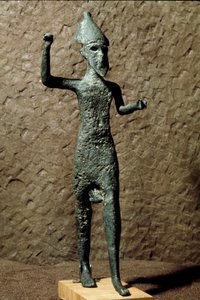 Fénicia: figurka boha v bronzu. Najděte v moři poblíž Selinunte (Selinonte), Sicílie. 14.-13. století před naším letopočtem. Palermo, Národní archeologické muzeum