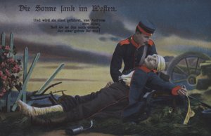 Slunce zapadá na západě: německý voják utěšuje svého umírajícího spolubojovníka na bojišti (barevná fotografie) od Photographer German