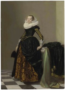 Portrét bohatě oděné mladé dámy v plné velikosti před prostřeným stolem od Pieter Codde