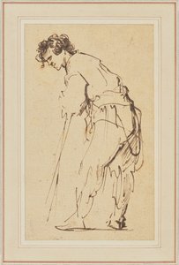 Mladý muž opírající se o hůl od Rembrandt Harmensz. van Rijn