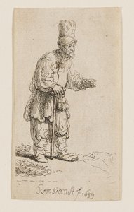 Sedlák ve vysoké čepici, stojící a opírající se o hůl od Rembrandt van Rijn