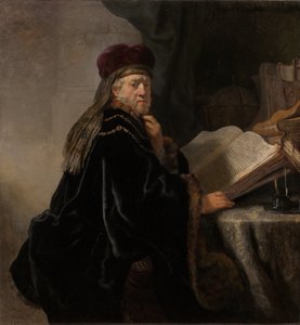 Učenec sedící u stolu Učenec ve své studii od Rembrandt van Rijn