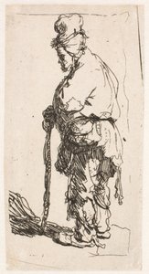 Žebrák opírající se o hůl, pohledem směřujícím doleva od Rembrandt van Rijn
