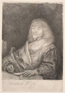 Muž u stolu, na krku má křížek na řetízku od Rembrandt van Rijn