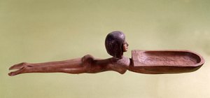 Egyptská starožitnost: Dřevěná lžíce na kosmetickou lžičku zvanou nahý plavec držící kachnu. 18. dynastie, nová říše. Paříž, muzeum Louvre