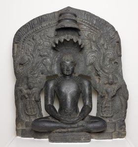 Jain Tirthankar Parshvanath s hadí kapucí sedící v meditaci (Dhyamudra), z Karnataka, Indie (chlorit)