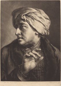 Muž s turbanem a pruhovanou košilí