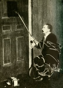 John Nevil Maskelyne provádí iluzi duchovní kabinetu, c1910. od Unbekannt