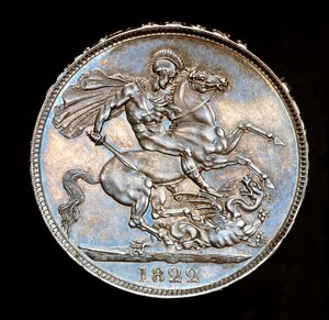 Vzácná britská mince, král Jiří IV., stříbrná koruna, patron Anglie na koni s mečem, který se chystá zabít draka, ražba Bernedetto Pistrucci od Unbekannter Künstler