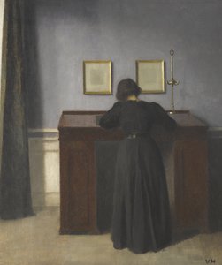 Ida stojící u stolu od Vilhelm Hammershøi