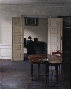 Interiér s Idou hrající na klavír od Vilhelm Hammershøi