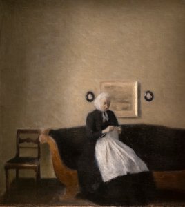 Interiér s umělcovou matkou od Vilhelm Hammershoi
