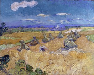 Pšeničné pole se snopy a žacím strojem od Vincent van Gogh