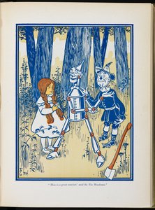Dorothy, cínový dřevorubec a strašák.