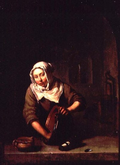 Žena čištění od Caspar Netscher