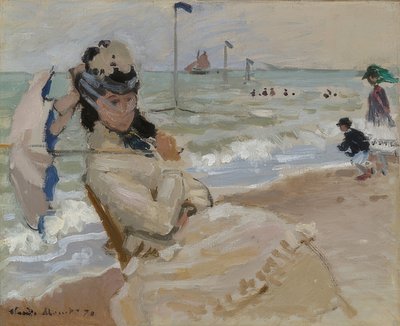 Camille na pláži Trouville. 1870 od Claude Monet