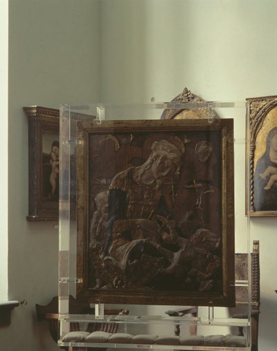 Madonna s dítětem (polychromovaná omítka, dřevo, kůže, sklo) od Donatello