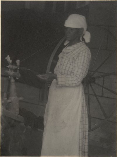 Žena u kolovratu od Doris Ulmann