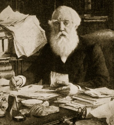 Austen Henry Layard sedí u svého stolu od English School