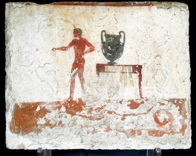 Etruské umění: mladý nahý eféb u stolu, kde je umístěna váza. Freska hrobu „potápěče“. Z jižního hřbitova Paestum. 480-470 před naším letopočtem. Museo Archeologico Nazionale, Paestum od Etruscan