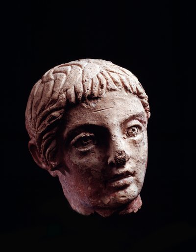 Etruská civilizace: hlava mladého muže z chrámu Belvedere, v Orvietu - 5.-4. století př. n. l. Průměr 13 cm od Etruscan