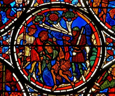 Detail z okna zobrazující podobenství o milosrdném Samaritánovi: mužské šaty jsou ukradeny od French School