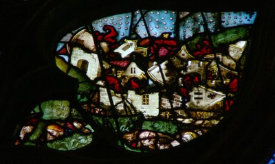 Západní rozeta zobrazující scénu z Knihy Zjevení: velké zemětřesení a kroupy těžké jako mince 16:18-21) od French School