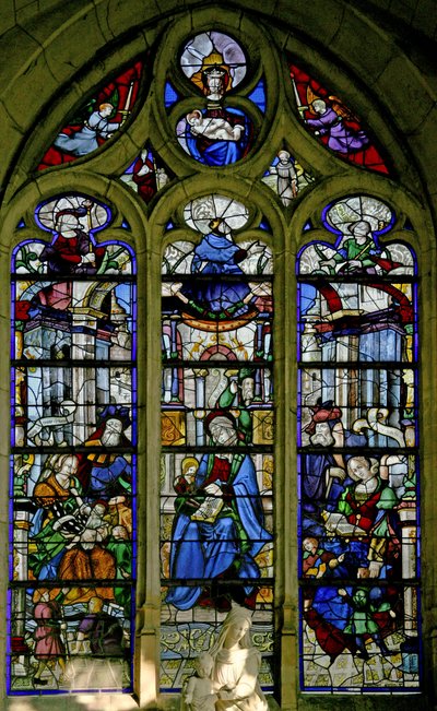 Okno w6 zobrazující svatou Annu, která učí Pannu číst; Mary Jacobe a Mary Salome a rodiny; David, Asa, Josias výše od French School