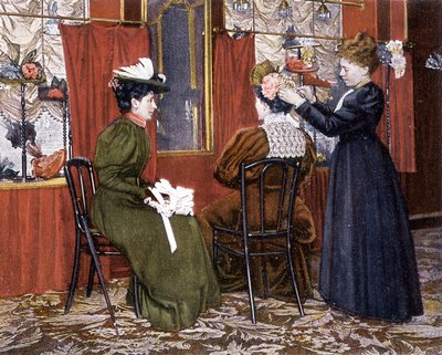 Žena stylizující dámu s kloboukem v Maison Nouvelle od French School