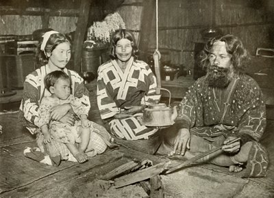 Ainu Man and Women at Home, 1910. od Herbert Ponting