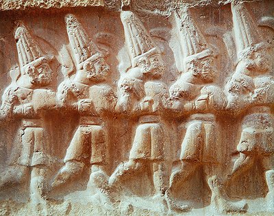 Detail průvodu ozbrojených bohů (kámen) od Hittite