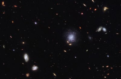 Kilonova a hostitelská galaxie od James Webb Space Telescope (NASA)