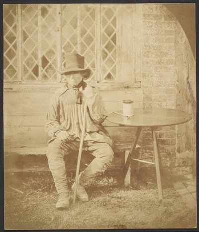 [Muž sedící u stolu] od John Whistler