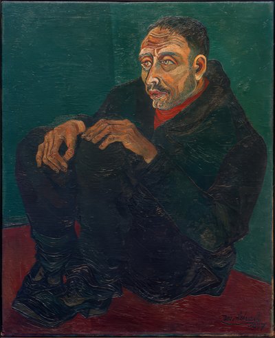Dřepící muž v tmavém obleku od Josef Scharl