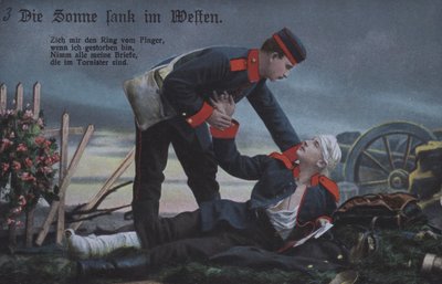 Slunce zapadá na západě: německý voják utěšuje svého umírajícího spolubojovníka na bojišti (barevné foto) od Photographer German