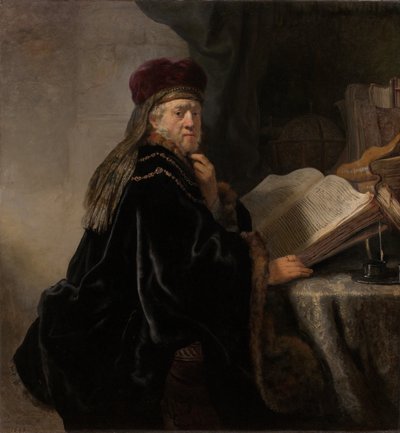 Učenec sedící u stolu Učenec ve své studii od Rembrandt van Rijn